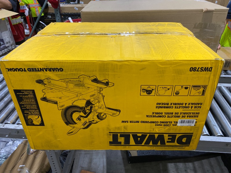 Photo 1 of DEWALT Miter Saw, 12-inch Double Bevel Sliding Compound Miter Saw with XPS LED Shadow Light System, Includes Blade Wrench, Material Clamp and Dust Bag (DWS780)