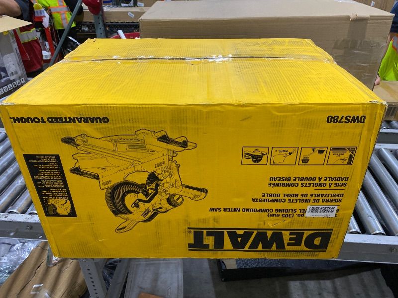 Photo 1 of DEWALT Miter Saw, 12 Inch Double Bevel Sliding Compound Miter Saw, Includes Blade Wrench and Clamp, Increased Crosscut Capacity, Powerful 3800 RPM Motor 15 Amp (DWS779)