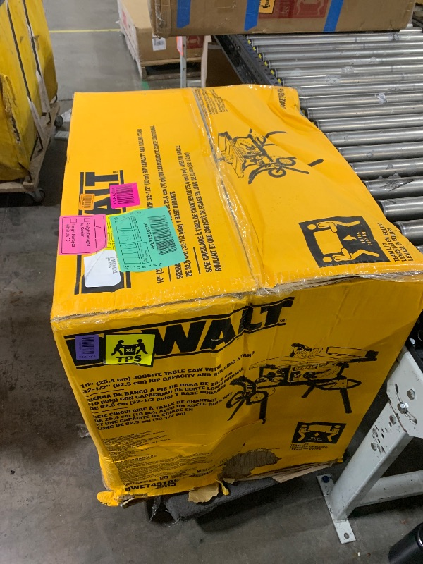 Photo 1 of DEWALT Table Saw 10 Inch with Foldable Rolling Table Saw Stand, 15 Amp, 4800 RPM, 32-1/2-Inch Rip Capacity (DWE7491RS)