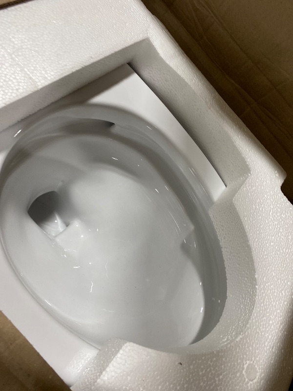 Photo 1 of TOTO Drake Transitional Two-Piece Elongated 1.28 GPF Universal Height TORNADO FLUSH Toilet with CEFIONTECT, Cotton White - CST786CEFG#01