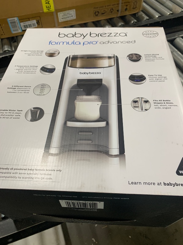 Photo 1 of Baby Brezza New and Improved Formula Pro Advanced Formula Dispenser Machine - Automatically Mix a Warm Formula Bottle Instantly - Easily Make Bottle with Automatic Powder Blending, White