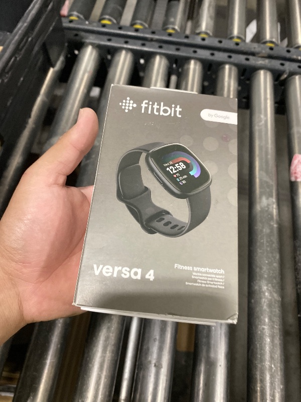 Photo 1 of Fitbit Versa 4 Fitness Smartwatch with Daily Readiness - 3-Month Google Health Premium Membership Included - GPS, 24/7 Heart Rate, 40+ Exercise Modes, Sleep Tracking - Black/Graphite