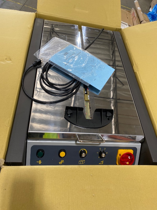 Photo 1 of IDL Packaging Semi-Automatic Table Top Strapping Machine for Polypropylene (PP) Strapping - Closed Cabinet Design - Electronic Tension Control - Quality Materials and Low Maintenance Needs