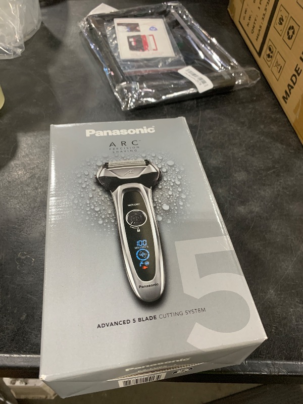Photo 1 of Panasonic ARC5 Electric Razor for Men with Pop-Up Trimmer, Wet/Dry 5-Blade Electric Shaver with Intelligent Shave Sensor and Multi-Flex Pivoting Head, ES-LV65-S (Silver)