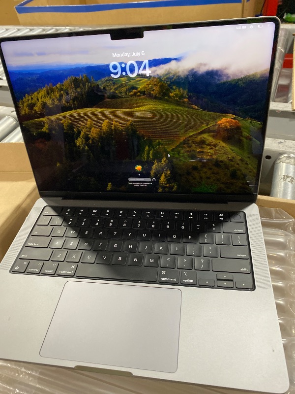 Photo 1 of Apple MacBook Pro 2021 with Apple M1 Pro chip (14-inch, 16GB RAM, 512GB SSD) - Space Gray (Renewed)