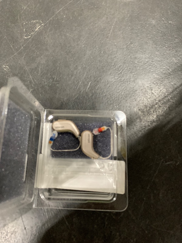Photo 1 of Oticon Intent Smart Charger miniRITE – Fast Charging Dock Exclusively for Oticon Intent Hearing Aids, Magnetic Alignment, and LED Power Indicator