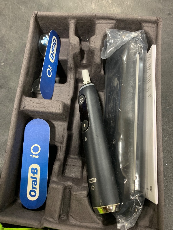 Photo 1 of Oral-B Rechargeable Electric Toothbrush, iO9 Limited Ultimate Clean, 7 Cleaning Modes, Interactive Display, iSense Charger, Charging Travel Case, Visible Pressure Sensor, 3 Brush Heads, Black