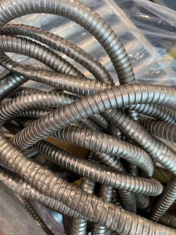 Photo 1 of [Item dented, might not function properly] Bionic Steel 25 Ft Metal Garden Hose with Nozzle, 25Ft x 5/8 In. Premium 304 Stainless Steel Metal Water Hose, Flexible Non Kinking, Lightweight, Heavy Duty, for Yard, Outdoor