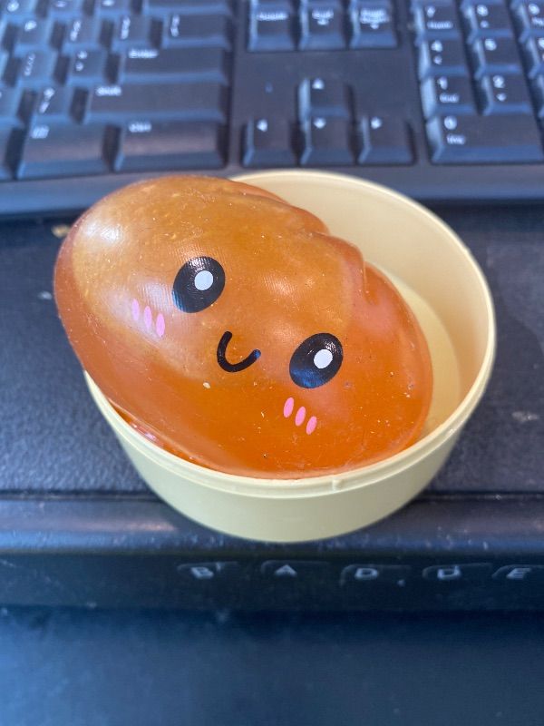 Photo 1 of [ORANGE NOT GOLD] Dumpling Squishy, Glitter Dumpling, Dumplings Style Stress Balls for Adults and Kids, Cute Steamer Basket Design with Squeezable Bun Stress Relief Fidget Toys (ORANGE Glitter 1 PC)