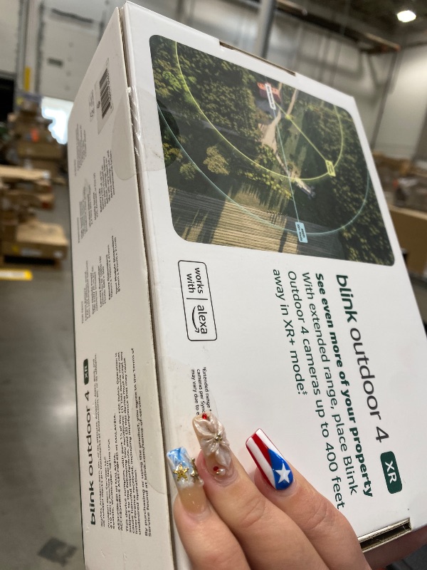 Photo 1 of ******** SEALED BY COMPANY******* Blink Outdoor 4 XR – two-year battery wireless camera with 4x security coverage, 1000 ft open-air range or 400 ft with typical use — 4 camera system.