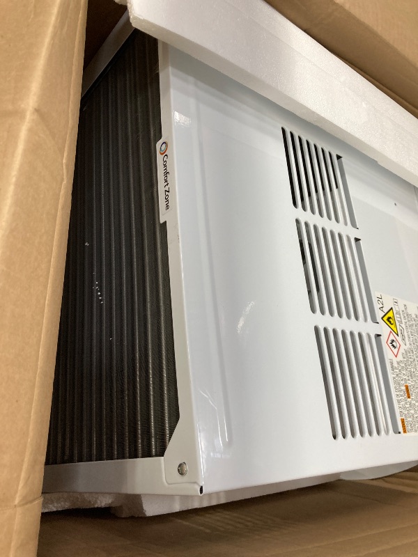 Photo 1 of **NOT TESTED**
Remote control not included.
.Comfort Zone Window Mounted Smart Wi-Fi Room Air Conditioner with Remote Control, 10,000 BTU, Digital Display, 4 Speed Settings, 4 Mode Settings, 24-Hour Timer, Sleep Setting, and Eco
