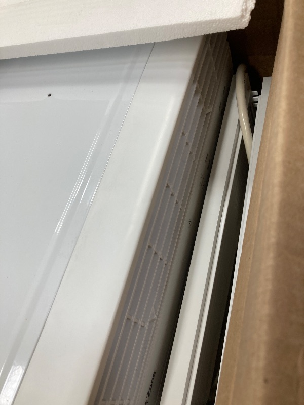 Photo 1 of **NOT TESTED**
Remote control not included.
.Comfort Zone Window Mounted Smart Wi-Fi Room Air Conditioner with Remote Control, 10,000 BTU, Digital Display, 4 Speed Settings, 4 Mode Settings, 24-Hour Timer, Sleep Setting, and Eco