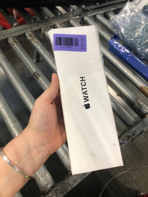 Photo 1 of [LOCKED] Apple Watch SE (2nd Gen) [GPS 40mm] Smartwatch with Starlight Aluminum Case with Lake Green Sport Loop One Size. Fitness and Sleep Trackers, Crash Detection, Heart Rate Monitor, Carbon Neutral