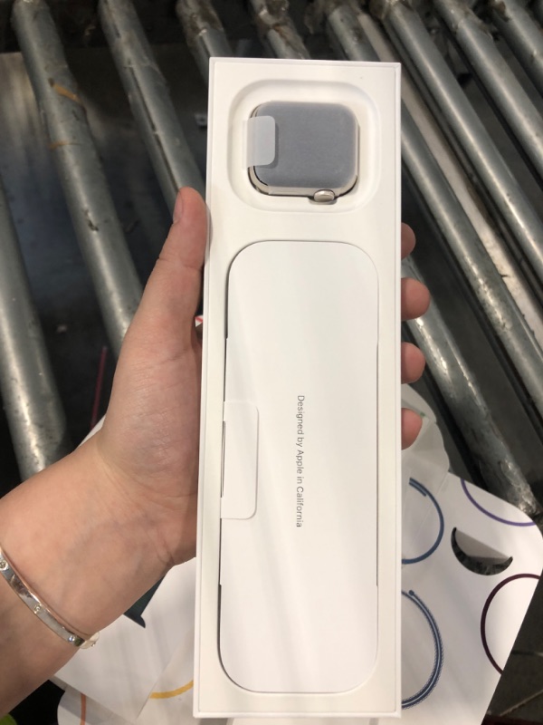 Photo 1 of [LOCKED] Apple Watch SE (2nd Gen) [GPS 40mm] Smartwatch with Starlight Aluminum Case with Lake Green Sport Loop One Size. Fitness and Sleep Trackers, Crash Detection, Heart Rate Monitor, Carbon Neutral