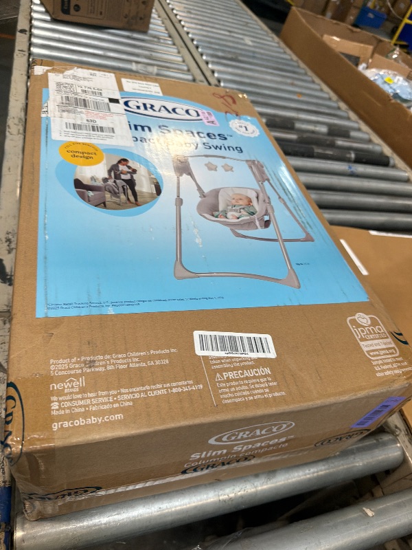Photo 1 of ****CHECKED  7/11 - AS IS/NO RETURNS - SALE FINAL - FOR PARTS ONLY****Graco Slim Spaces Compact Baby Swing, Space Saving Portable Bay Swing with Height Adjustable Legs & Soft Toys, Reign