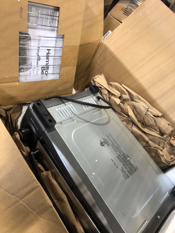 Photo 1 of ** ONLY PARTS/ DAMAGE MAJOR** Hamilton Beach Easy Reach 4-Slice Countertop Toaster Oven With Roll-Top Door, 1200 Watts, Fits 9” Pizza, 3 Cooking Functions for Bake, Broil and Toast, Silver (31344DA)