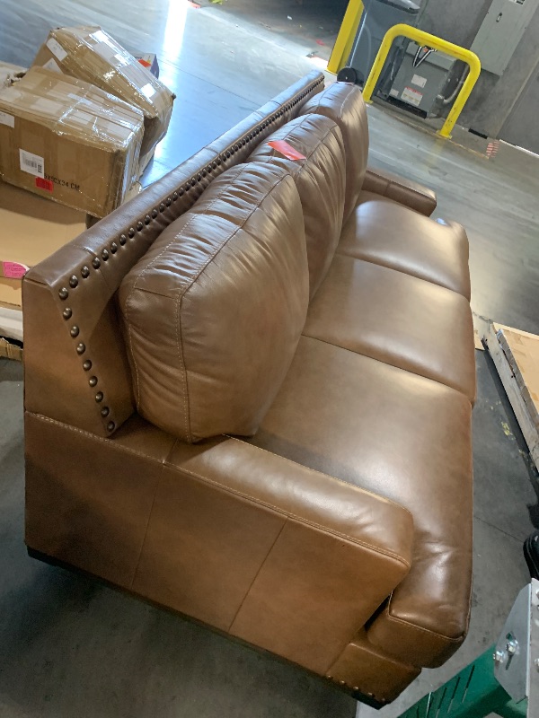 Photo 1 of ***TRUCK/TRAILER PICKUP ONLY***Signature Design by Ashley Leather Couch, 90 in, Amber Brown, Brendola