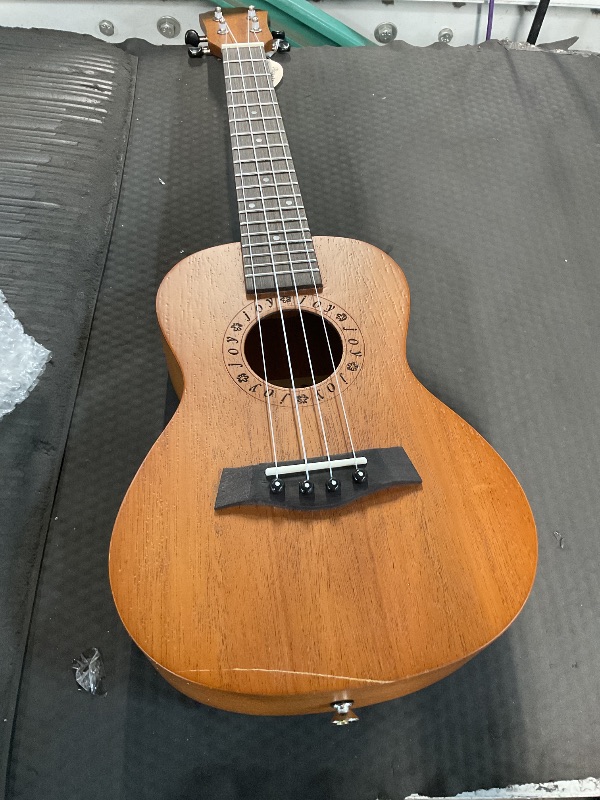 View 4 of *** has a minor scratch on the bottom **
JOYMUSIC 23" Concert Ukulele Kit