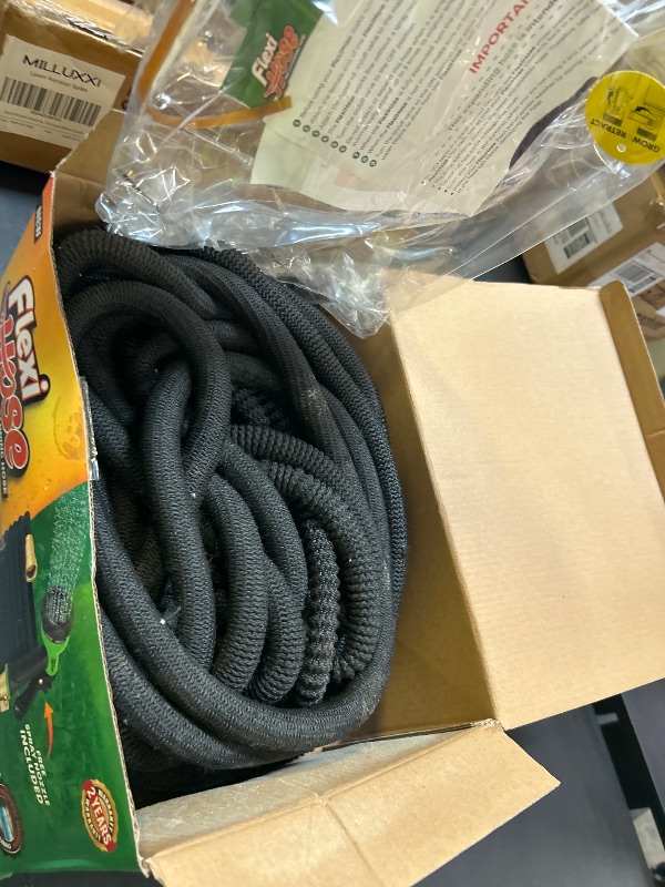 Photo 1 of Flexi Hose Expandable Garden Hose with 8 Function Nozzle, 150FT - Lightweight Retractable Garden Hose, Water Hose - No-Kink Flexibility, 3/4 Inch Solid Brass Fittings and Double Latex Core