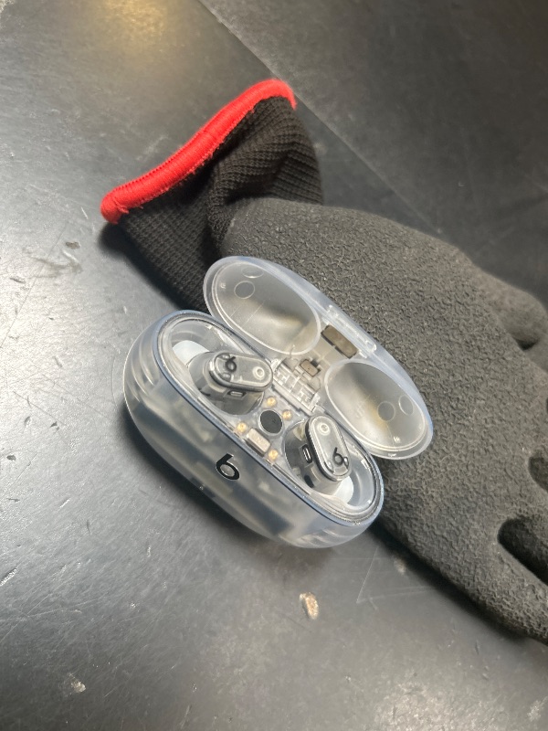 Photo 1 of Beats Studio Buds + | True Wireless Noise Cancelling Earbuds, Enhanced Apple & Android Compatibility, Built-in Microphone, Sweat Resistant Bluetooth Headphones, Spatial Audio - Transparent