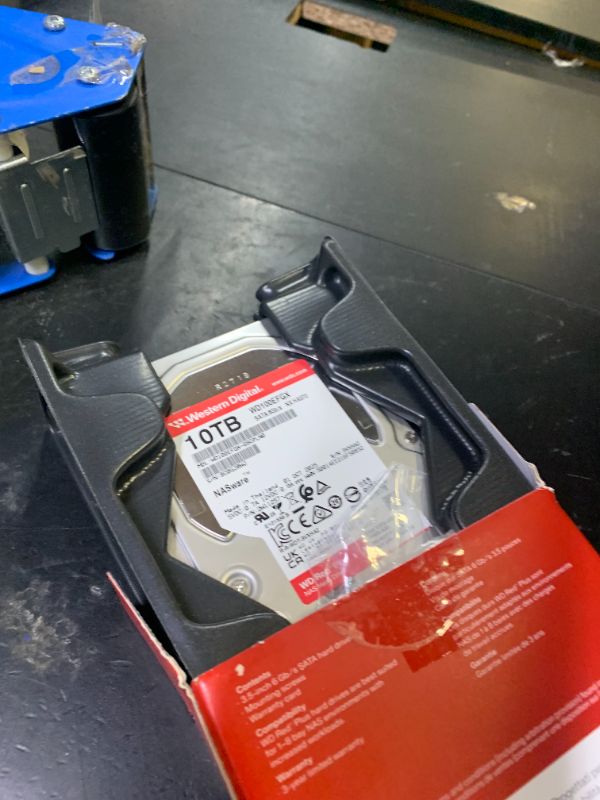Photo 1 of Western Digital 10TB WD Red Plus NAS Internal Hard Drive HDD - 7200 RPM, SATA 6 GB/s, CMR, 512 MB Cache, 3.5" - WD100EFGX