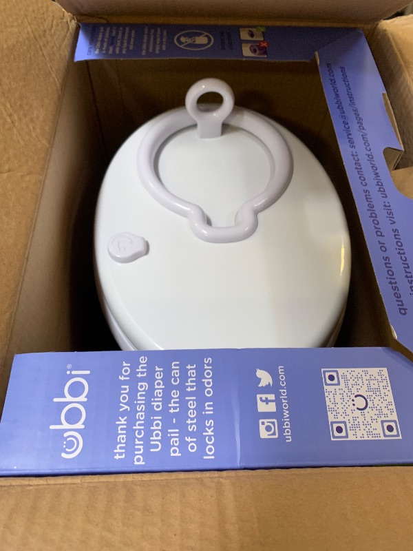 View 3 of Ubbi Steel Diaper Pail, Odor Locking, No Special Bag Required, Award-Winning, Registry Must-Have, White
