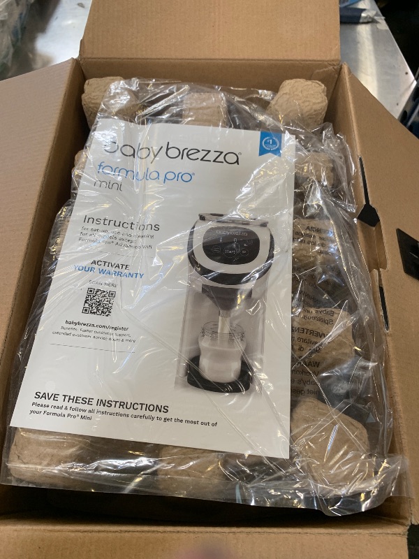 Photo 1 of Baby Brezza Formula Pro Mini Baby Formula Mixer Machine Fits Small Spaces and is Portable for Travel– Bottle Makers Makes The Perfect Bottle for Your Infant On The Go, White