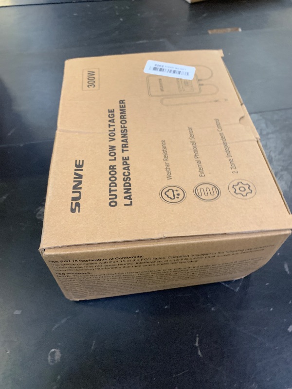 Photo 1 of SUNVIE 300W Low Voltage Landscape Transformer with 2 Independent Control Output Landscape Lighting Transformer with Timer and Photocell Sensor 120V AC to 12/14V AC Weatherproof Low Voltage Transformer