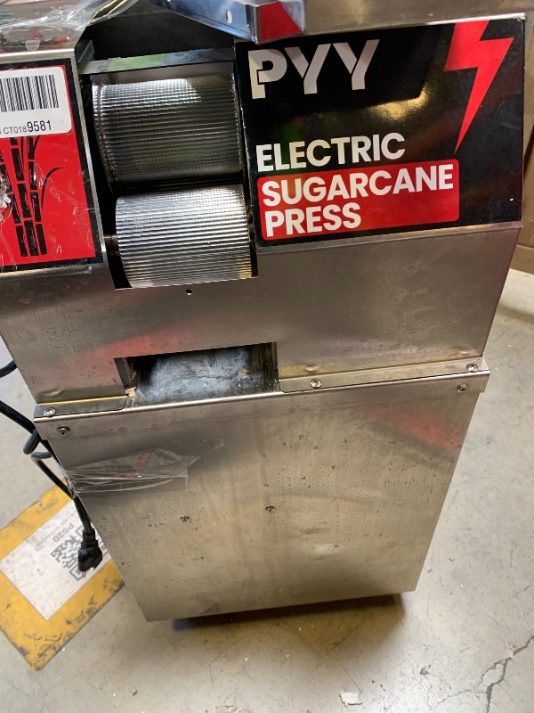 Photo 1 of eletric sugar cane juicer