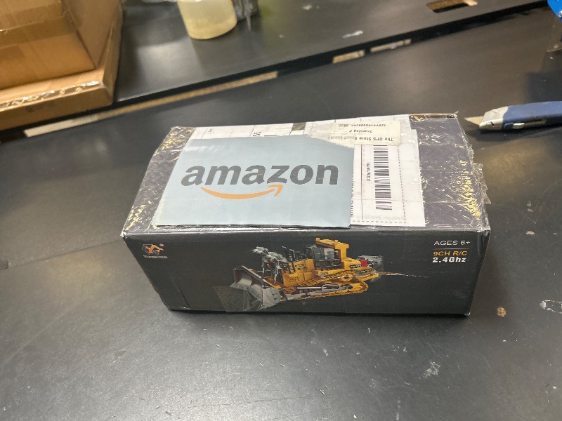 Photo 1 of Wdexual Remote Control Bulldozer - 11 Channel RC Dozer Front Loader Toy with Light and Sound - 1/24 Full Construction Vehicle Toys for Kids Age 6 7 8 9 10 and Up Years Old