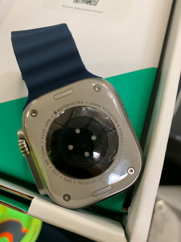 Photo 1 of Apple Watch Ultra 2 [GPS + Cellular, 49mm] - Titanium Case with Blue Ocean Band, One Size (Renewed Premium)
