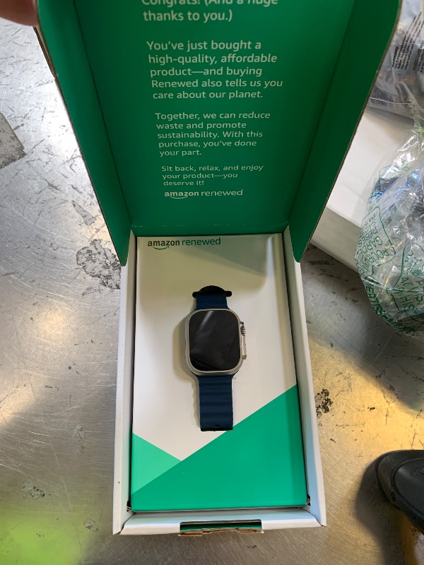 Photo 1 of Apple Watch Ultra 2 [GPS + Cellular, 49mm] - Titanium Case with Blue Ocean Band, One Size (Renewed Premium)