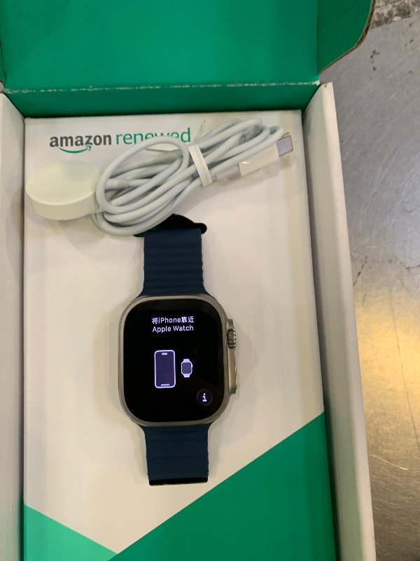 Photo 1 of Apple Watch Ultra 2 [GPS + Cellular, 49mm] - Titanium Case with Blue Ocean Band, One Size (Renewed Premium)