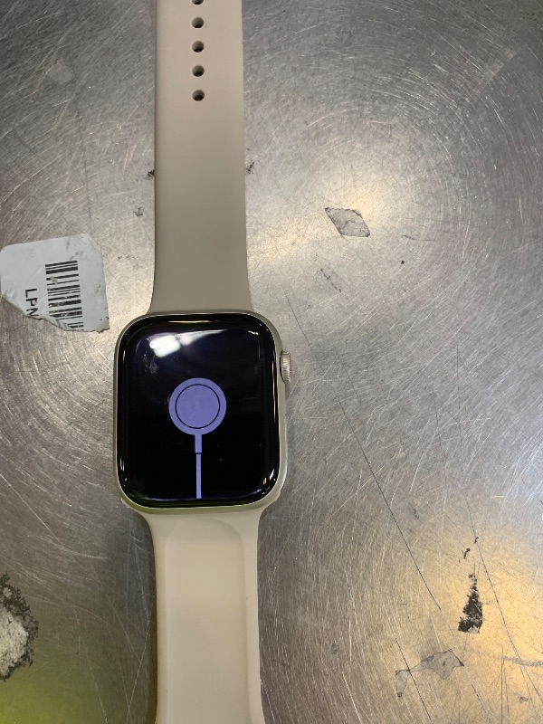 Photo 1 of Apple Watch Series 7 (GPS, 45mm) Starlight Aluminum Case with Starlight Sport Band, Regular (Renewed)1077513347