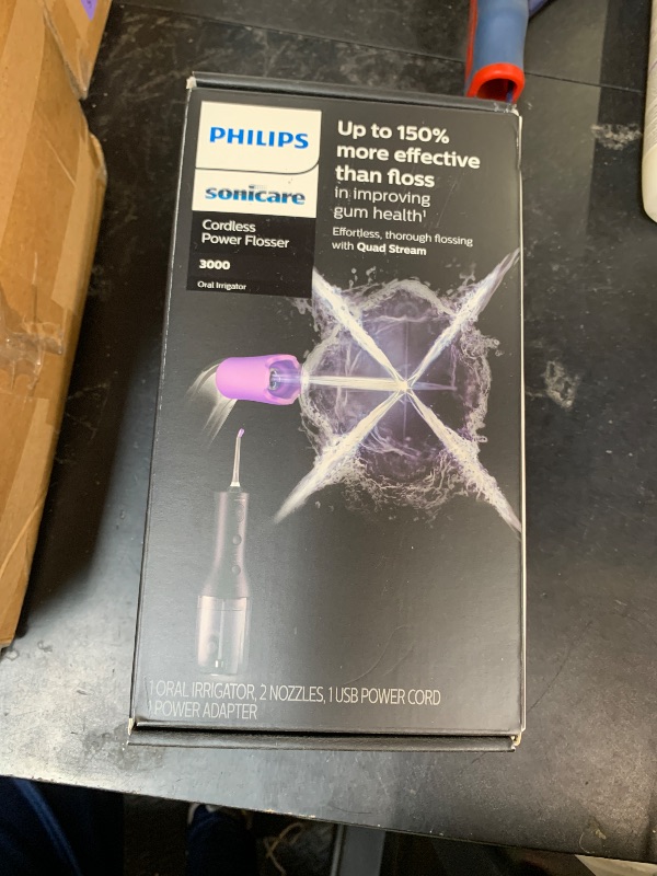 Photo 1 of Philips Sonicare Cordless Power Flosser 3000 - Water Flosser with Innovative Quad Stream Technology, Oral Irrigator with 2 Flossing Modes and 3 Pressure Levels, IPX7 Waterproof, Black, HX3826/23
