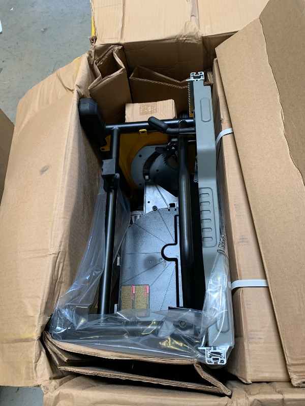 Photo 1 of DEWALT Table Saw 10 Inch with Foldable Rolling Table Saw Stand, 15 Amp, 4800 RPM, 32-1/2-Inch Rip Capacity (DWE7491RS)