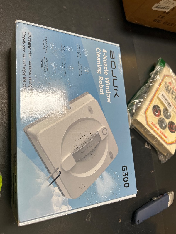 Photo 1 of BOJUK Window Cleaning Robot, 5000Pa Sauction with 4 Water Spray, 10-Stage Protection System, Intelligent Path Planning, 3 Cleaning Modes, Edge Detection for High Glass, Tiles, Mirror