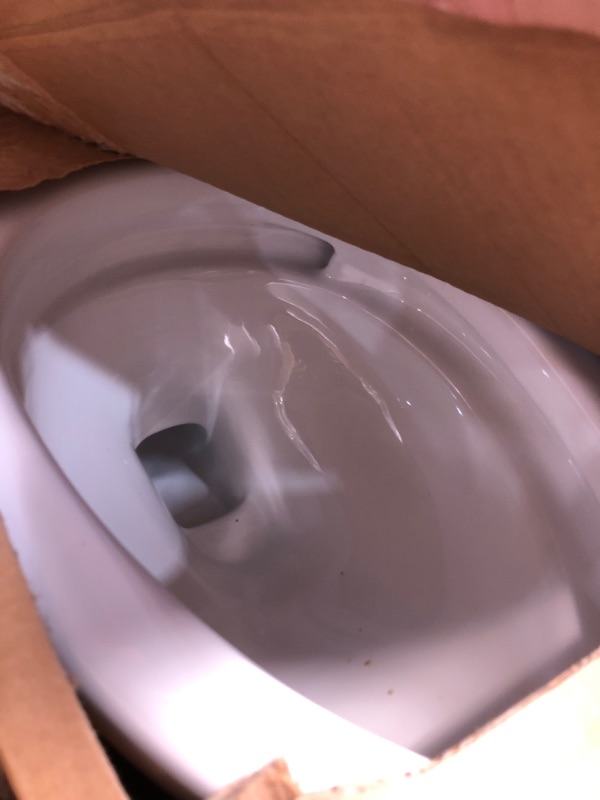 Photo 1 of **missing toilet tank** TOTO Drake 1.28 GPF Two-Piece Elongated Toilet