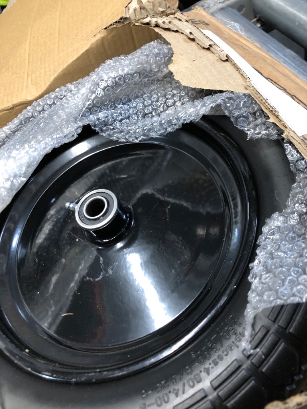 Photo 1 of ***STOCK PHOTO FOR REFERENCE ONLY***Upgraded 16" Flat Free Wheelbarrow Tire and Wheel, 4.80/4.00-8 Heavy Duty Solid Tire with 5/8" & 3/4" Bearings, 3"-7" Adjustable Hub - Universal for Wheelbarrows, Garden Trailer/Hand Truck - Black
