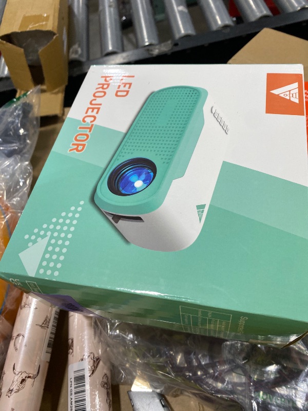 Photo 1 of Vamvo Mini Movie Projector with Wired Screen Mirroring