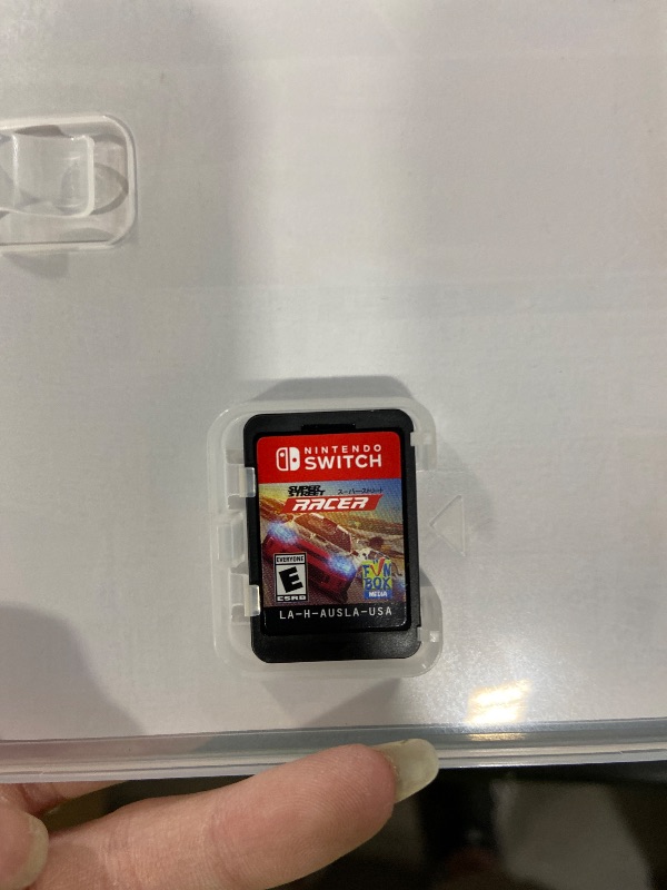 Photo 1 of Nintendo Switch with Neon Blue and Neon Red Joy-Con - Handheld Gaming Console