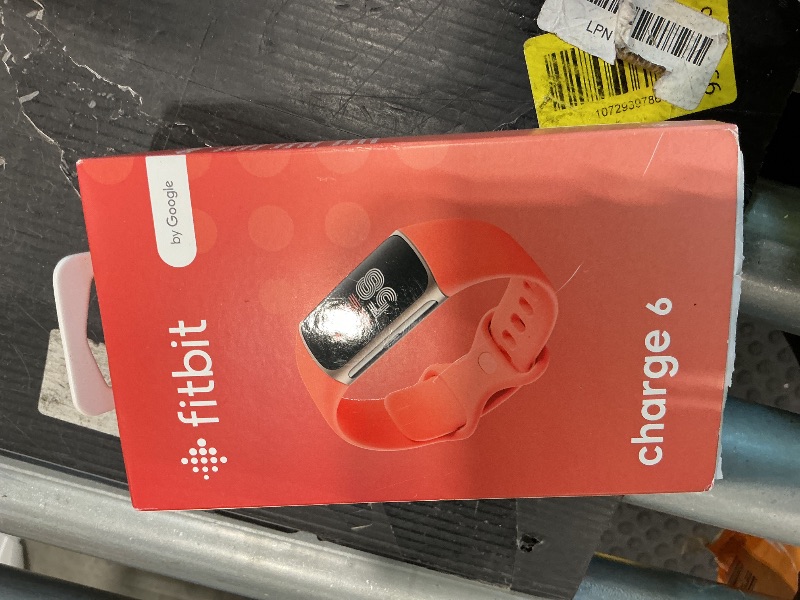 View 2 of [Just Charger and Watch Band] Fitbit Charge 6 Fitness Tracker with Google apps, Heart Rate on Exercise Equipment, 6-Months Premium Membership Included, GPS, Health Tools and More, Gold/Coral, One Size (S & L Bands Included)