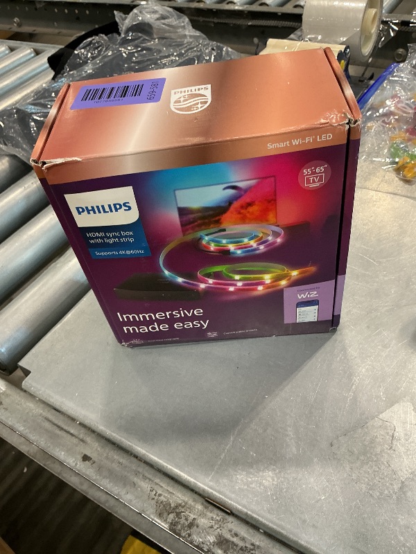 Photo 1 of PHILIPS Smart Lighting HDMI Sync Box with TV Backlight, RGBIC LED Strip for 55-65 Inch TV, Sync with Movies, Music, HDMI 2.0, 4K at 60Hz, App/Voice Controls, Requires External Video Source