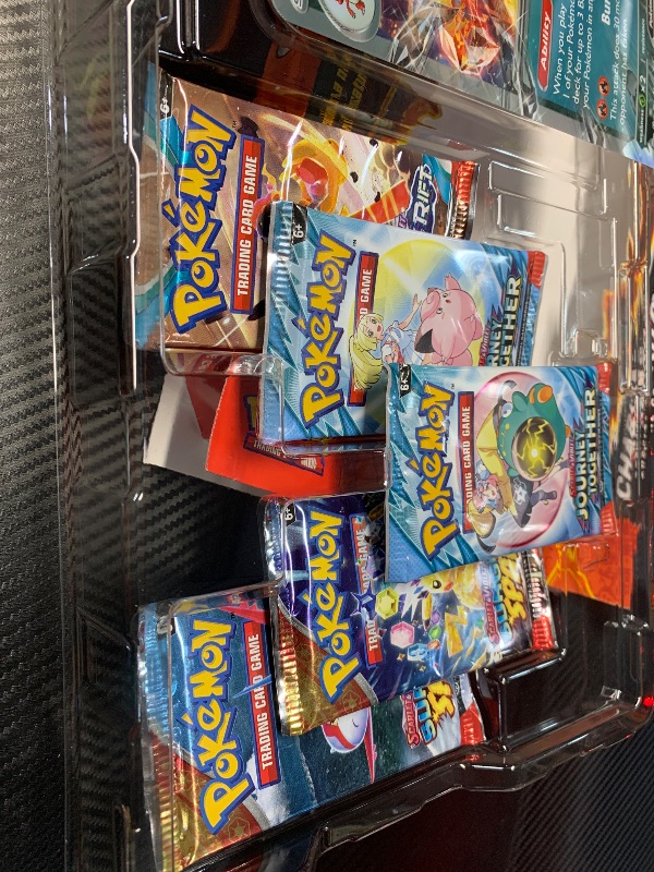 Photo 1 of ***CARD PACKS HAVE BEEN OPENED***

Pokemon TCG: Charizard ex Special Collection - 5 Packs, Promos