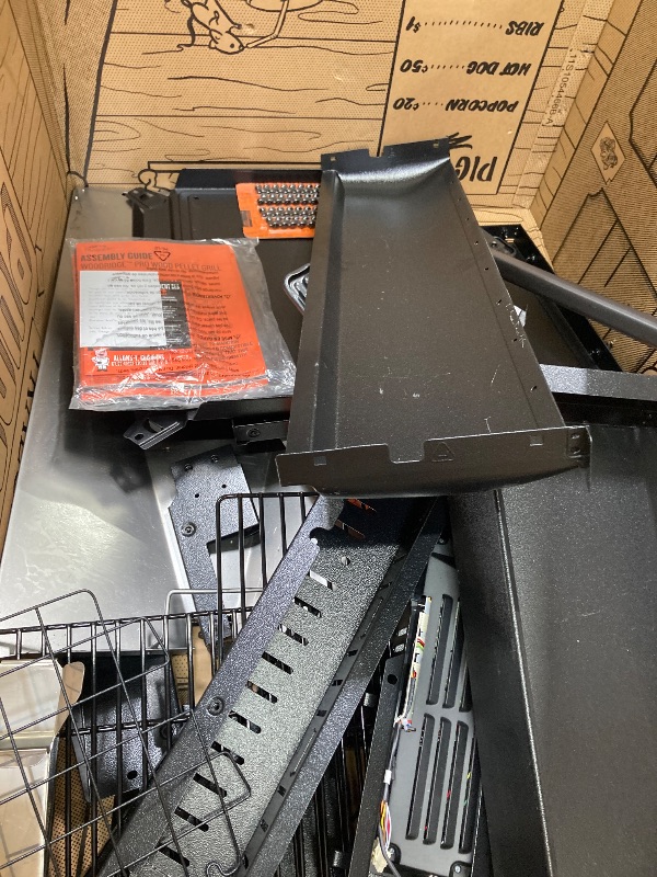 Photo 1 of ***DAMAGED-MISSING PIECES -SELLLING AS PARTS ONLY*** Traeger Grills Woodridge Pro Electric Wood Pellet Grill and Smoker, 970 Sq. In., Outdoor Pellet Smoker Grill with Digital Sensor and Side Shelf, Wi-FIRE Technology, Super Smoke Mode, Black, TFB97JLH