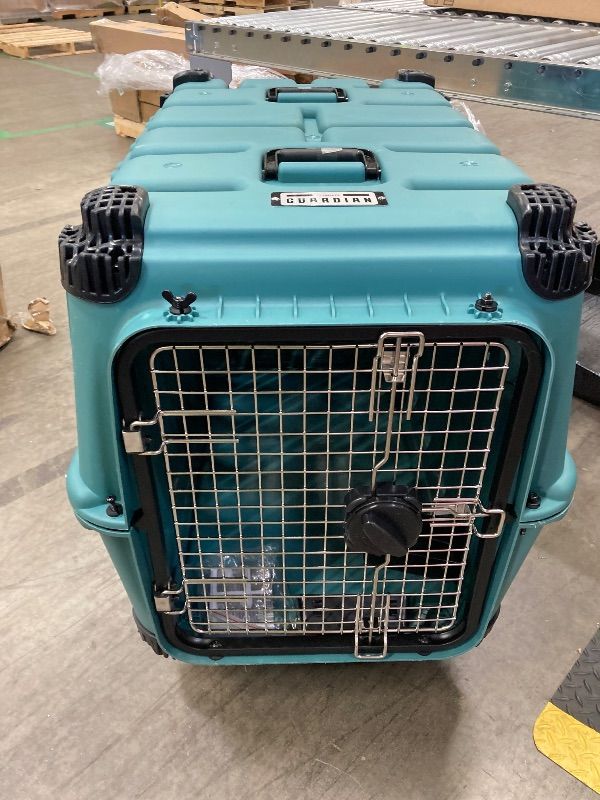 Photo 1 of **MINOR SIDE DAMAGE/MISSING SOME HARDWARE**Mammoth Guardian Dog Kennel 36" Heavy Duty Travel & Outdoor Crate for Puppies, Small, Medium & Large Dogs, Secure 3 Bolt Lock, Adventure Ready for Hunting, Camping & Offroad – Lagoon Blue Kennel