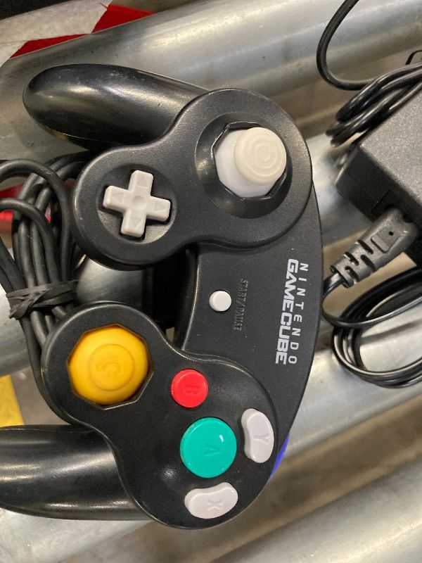 Photo 1 of **CONSOLE HAS SMALL OIL SPOTS ON COVER/NO BOX***GameCube (Jet Black) (Renewed)