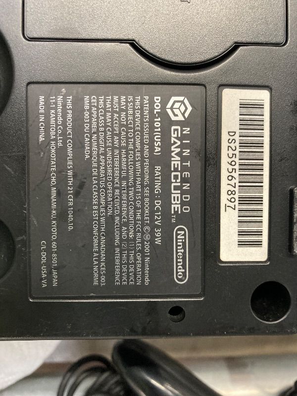 Photo 1 of **CONSOLE HAS SMALL OIL SPOTS ON COVER/NO BOX***GameCube (Jet Black) (Renewed)