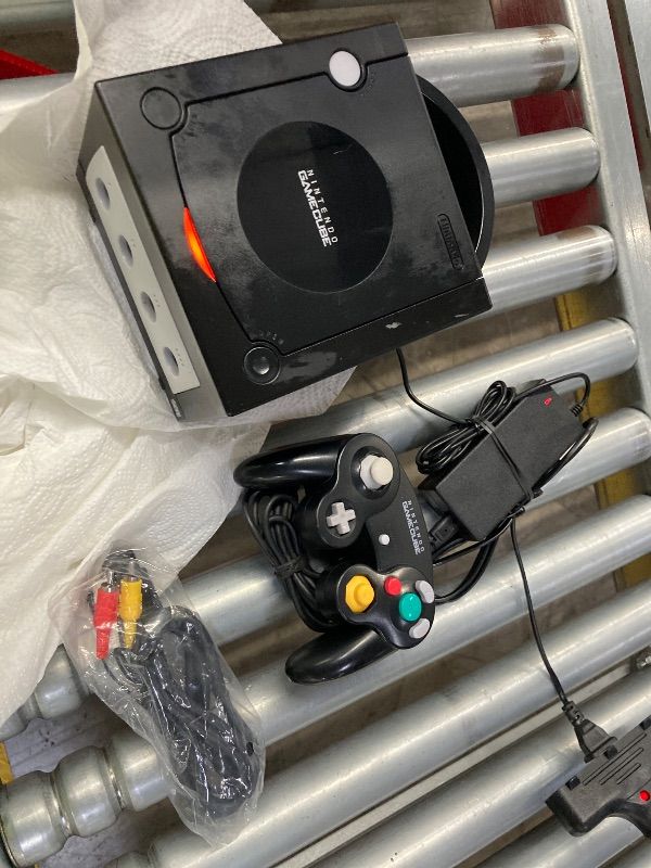 Photo 1 of **CONSOLE HAS SMALL OIL SPOTS ON COVER/NO BOX***GameCube (Jet Black) (Renewed)