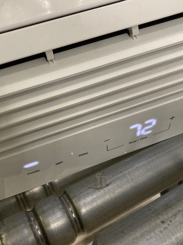 Photo 1 of ***USED*** GE Profile ClearView Inverter Window Air Conditioner Unit, 12,200 BTU, Energy Efficient Cooling up to 550 sq ft., Ultra Quiet, SMART Home Capable, Includes Remote, White